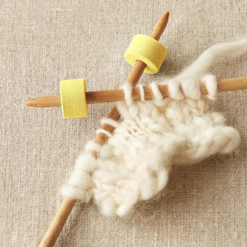 Bouchons pour aiguilles sur aiguilles à tricoter
