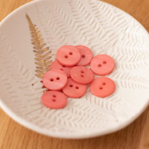 Boutons en nacre plat 2 trous - Corail